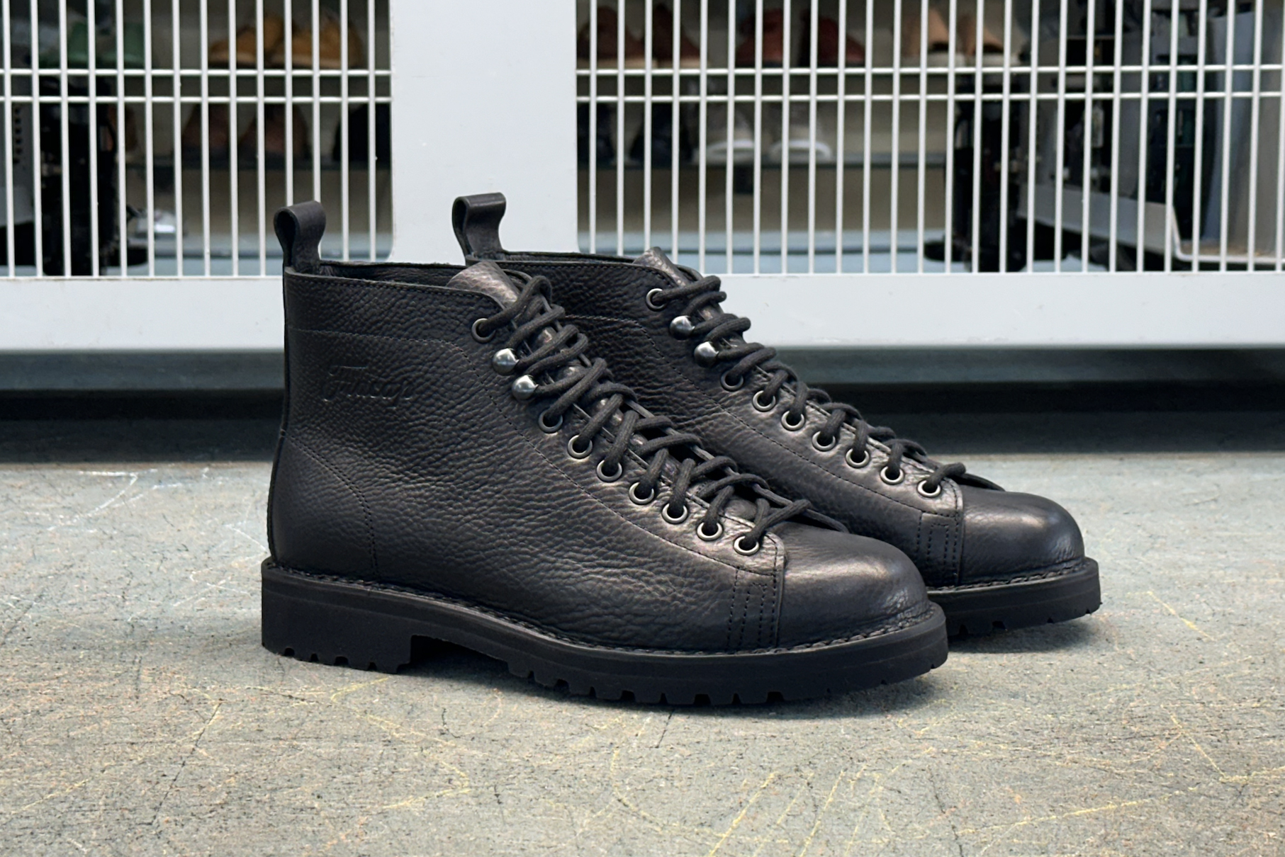 Fracap Monkey Boots handcrafted in Italy with ideal construction. Lace-up shoes in black colourway, they're formed with vegetable tanned leather and detailed with commando vibram sole.